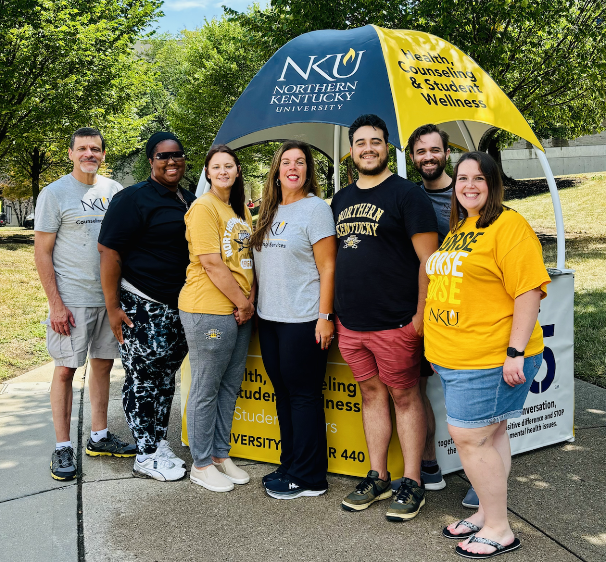 Counseling Services staff members tabled on campus to tell students about their services.